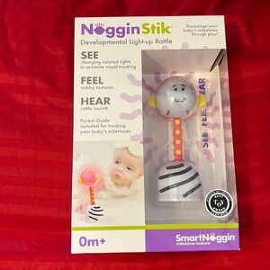 Noggin stick rattle